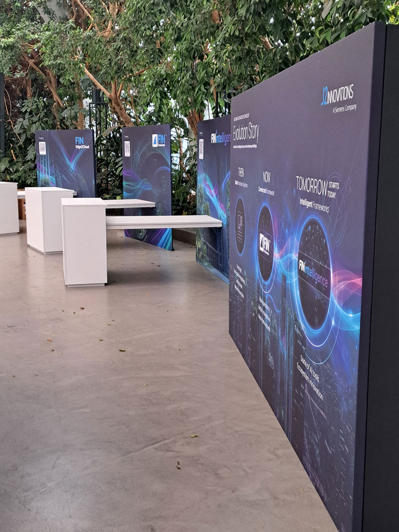 Innovative exhibition stand design: integrated structures, custom graphics and full wayfinding for J2 Innovations - 1