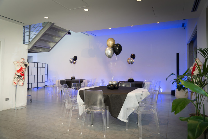 60th birthday party planning in a modern total white venue in Milan - 1