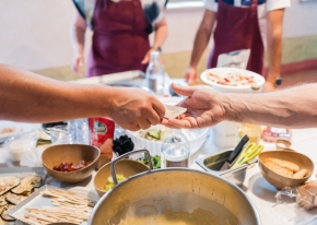 A team building day with a morning workshop and afternoon team-cooking led by renowned chefs